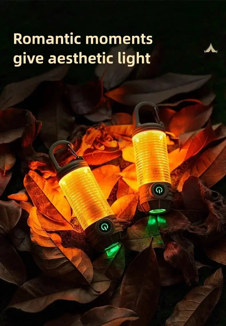 Two orange outdoor LED camping lanterns with black bases and green power buttons, rechargeable
