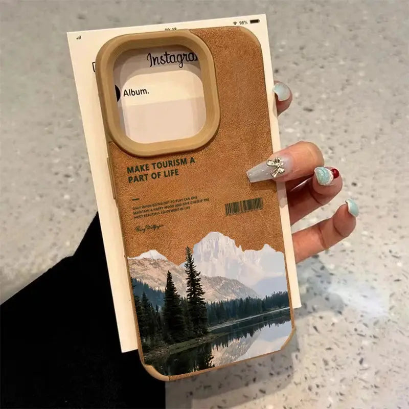 iPhone case with mountain lake scenery motif in tan faux leather