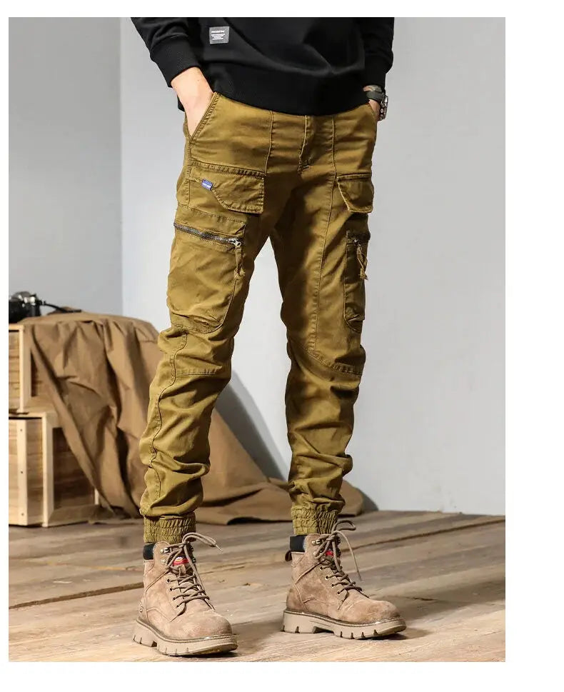 CAAYU men's cargo joggers in olive with multi-pocket design, zip pockets and elastic cuffs.