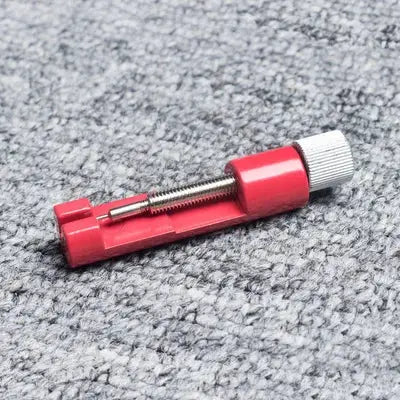 Watch band link pin remover tool, red metal with screw-knob for easy link removal