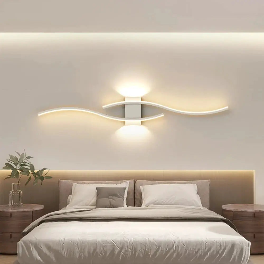 Moder LED wall lamp long strip by Simples Market with curved white light accents for bedroom decor