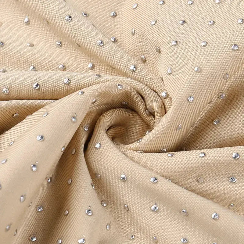 Beaded apricot mesh fabric with scattered rhinestones by Simples Market
