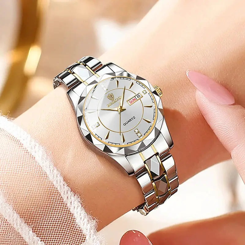 BINBONG women's luxury quartz wristwatch with silver stainless steel band and gold-tone accents, date window