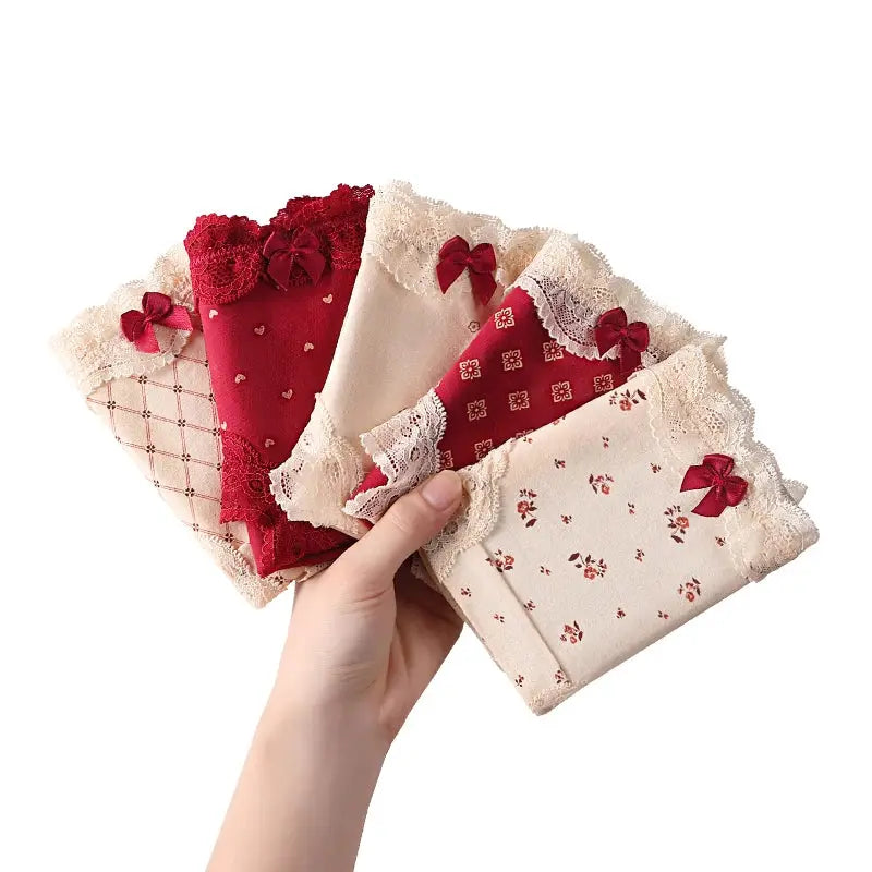 Triangular panties set, 6-pack cotton briefs with lace trim and bows in red and beige from Simples Market
