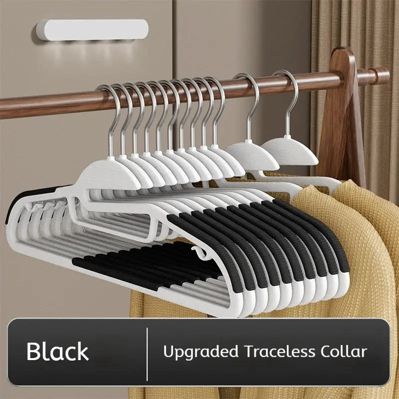 10-pack white multifunctional clothes hangers with anti-slip grips for wet and dry clothes in a wardrobe