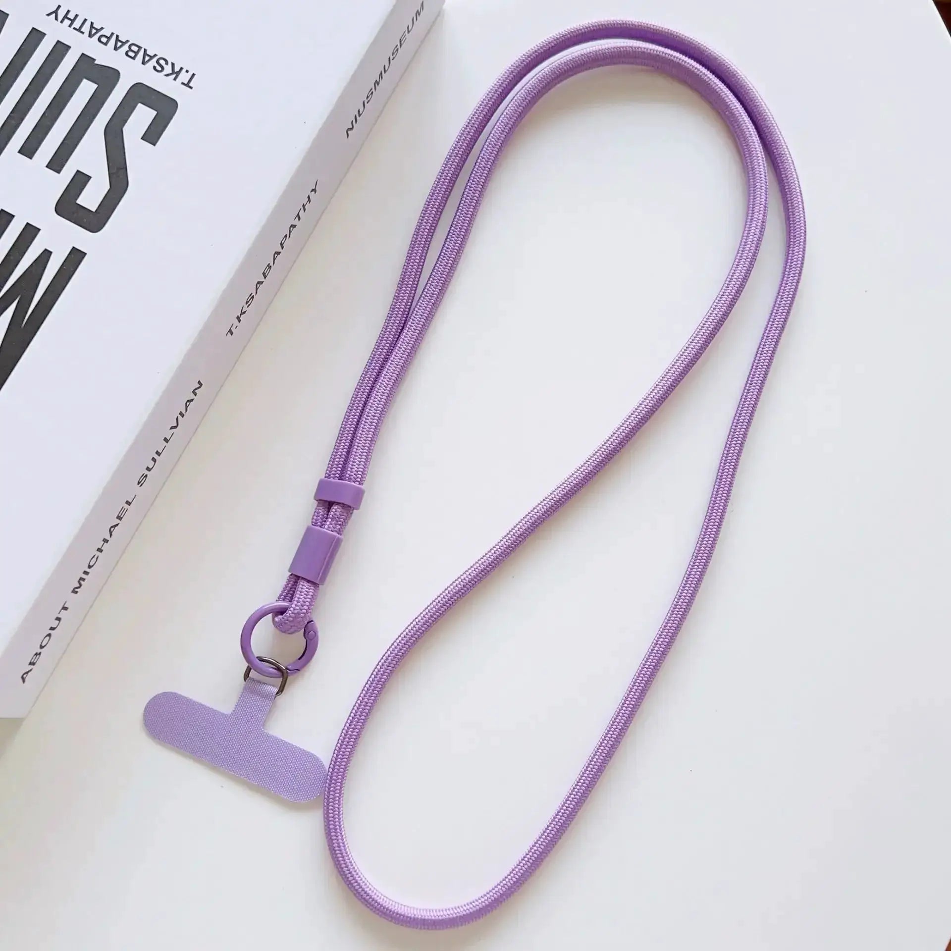 Phone lanyard by Simples Market: purple braided cord with adjustable slider and metal ring