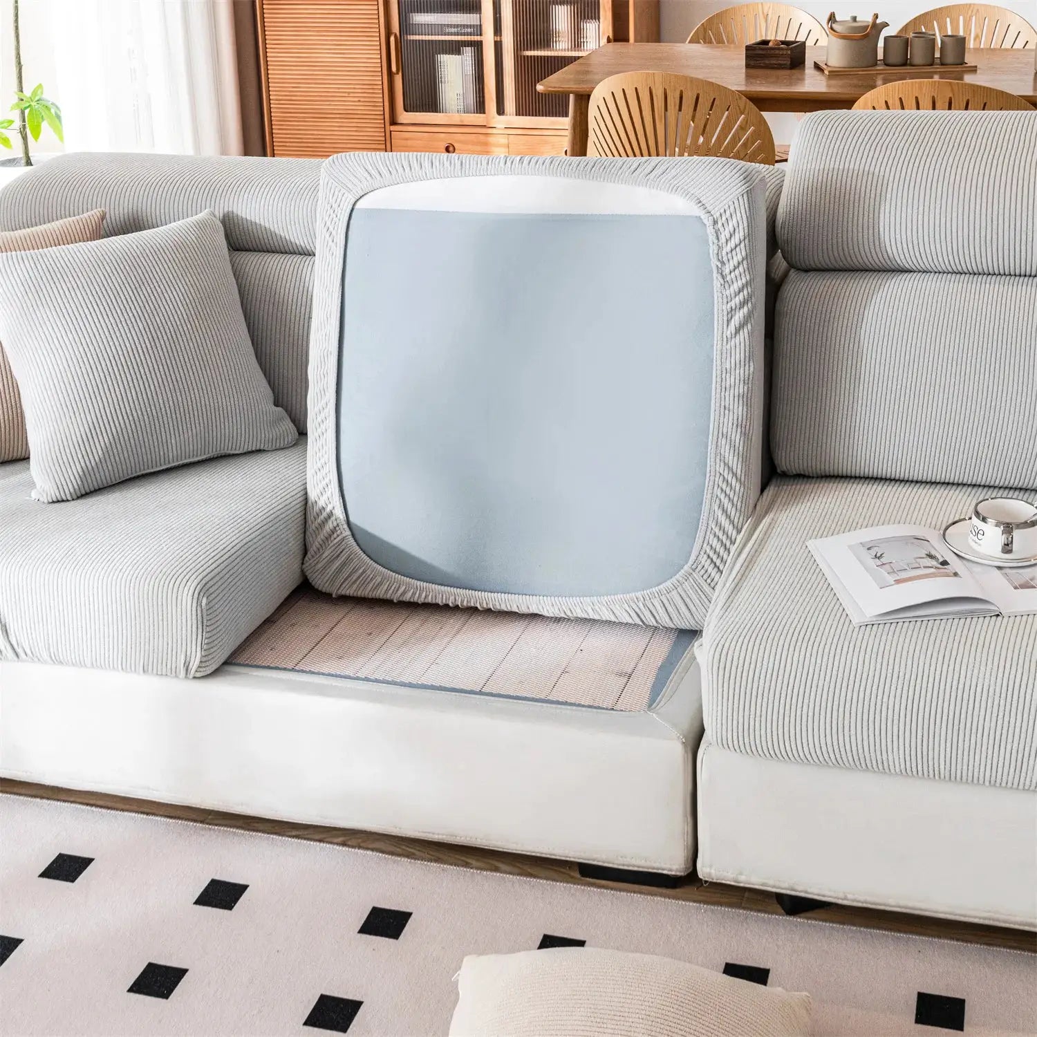 Removable sofa seat cushion cover in thick stripe jacquard, light gray stretch fabric; washable furniture protector.