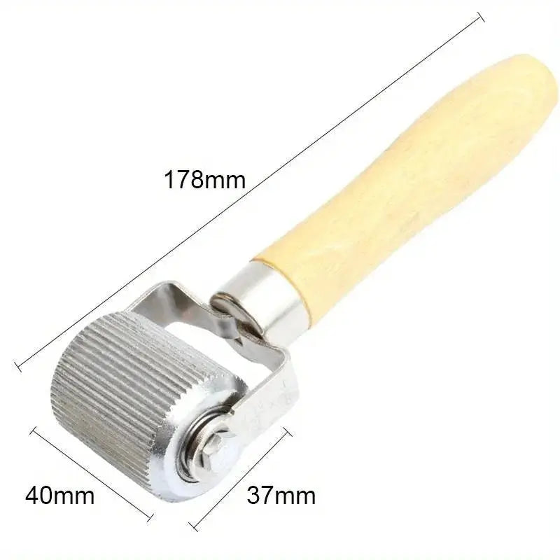 Car tire repair roller with wooden handle and metal head, 178mm long