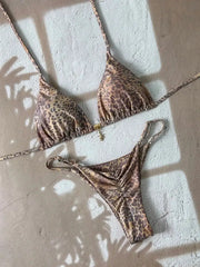 Leopard print two-piece bikini with triangle top and thong bottoms