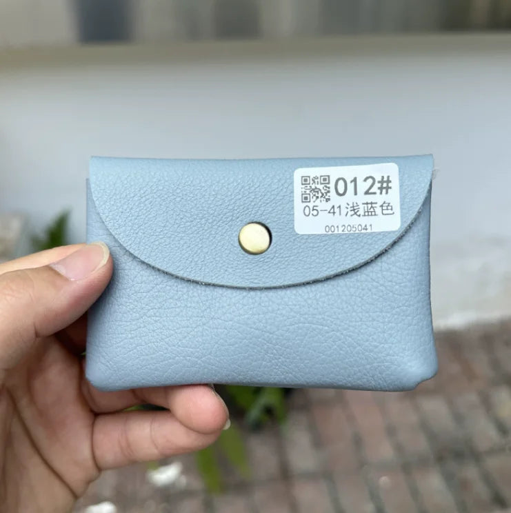 Genuine leather card holder by Simples Market in light blue with envelope flap