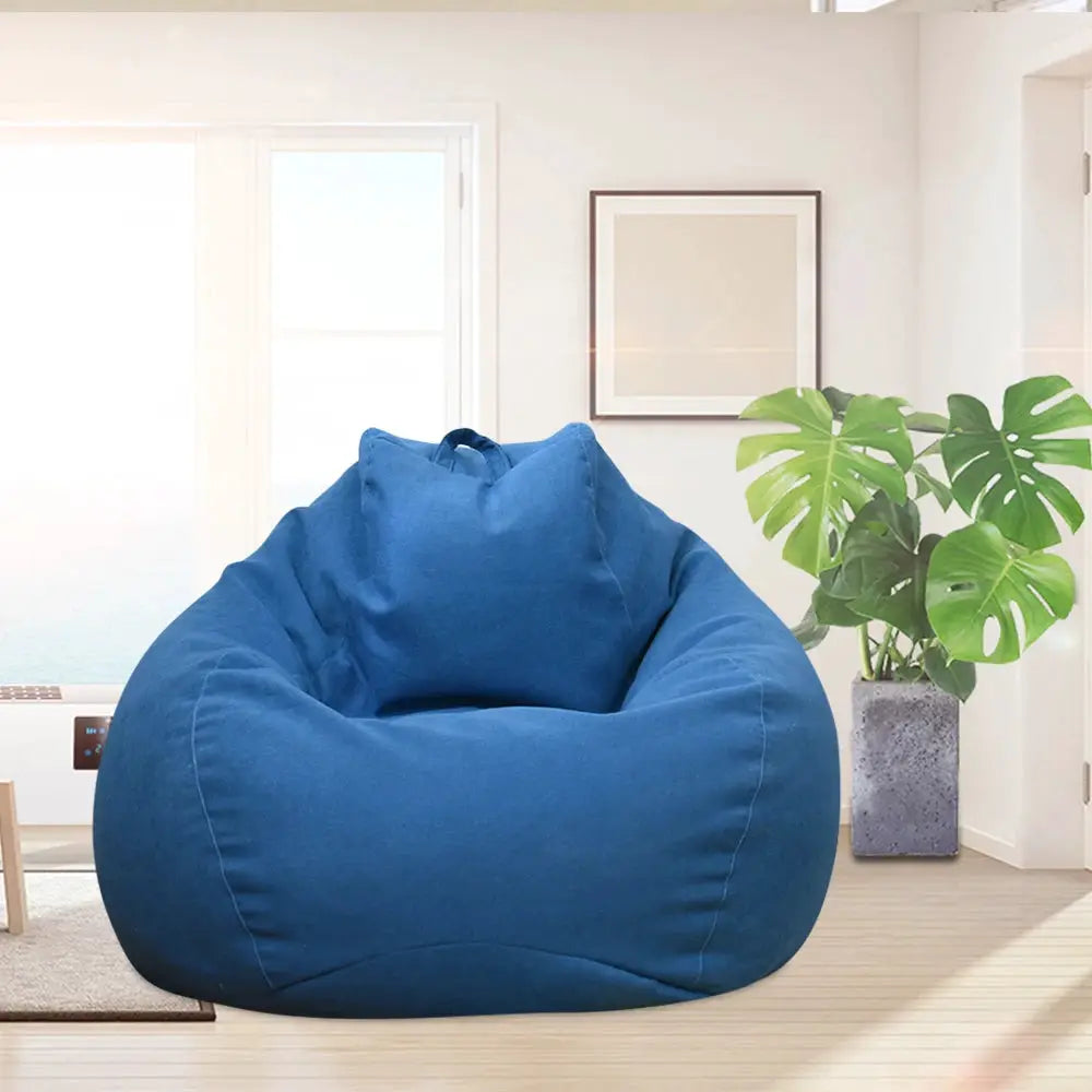 Large blue bean bag cover by Simples Market, filler-free, for adults lounging in the living room