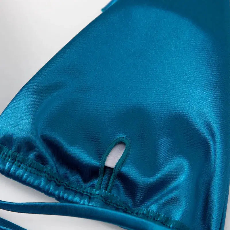 Bikini top halter style in teal metallic satin with elastic hem