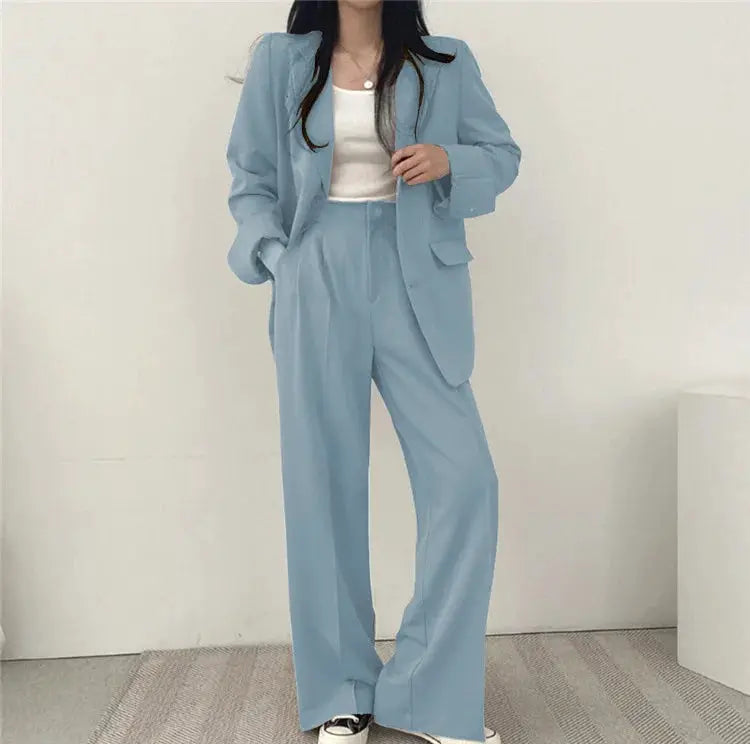 Women's two-piece blazer and pants suit in light blue by Simples Market