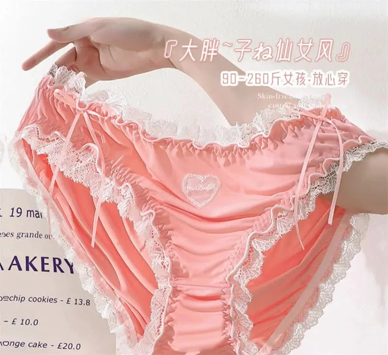 Pink lace panties with white lace trim and heart motif; plus-size lingerie