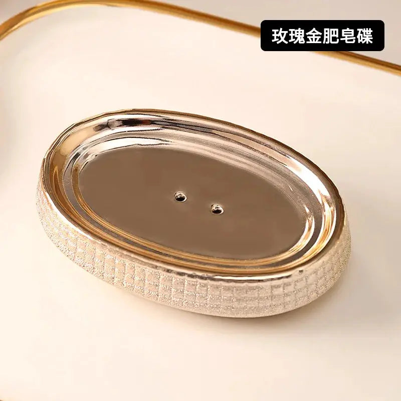 Rose gold ceramic soap dish with textured white border from Simples Market bathroom accessories set
