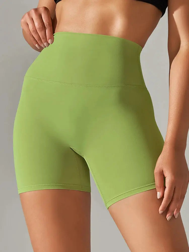 Women's lime green high-waist yoga shorts by Simples Market, squat-proof and quick-drying for workouts