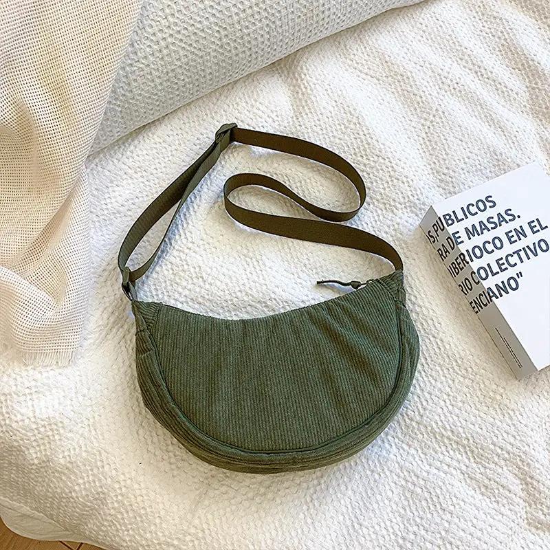 Hobo shoulder bag in olive green corduroy with adjustable strap