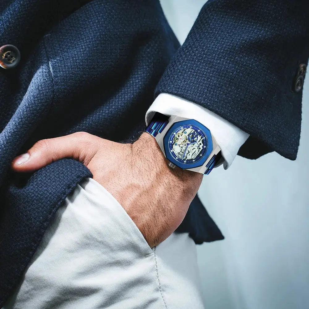 Forsining men's skeleton automatic watch with blue bezel, luminous hands, stainless steel strap