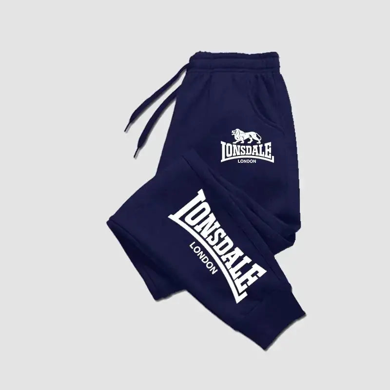 Men's navy jogger pants with white Lonsdale London logo and drawstring waist.