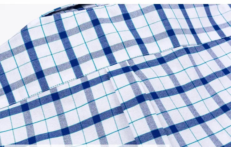 Men's 100% cotton oxford plaid shirt by Simples Market, long sleeve, blue and white with teal grid lines.
