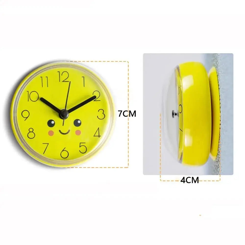 Yellow mini round wall clock with a cute smiling face, 7 cm diameter, quartz movement for bathroom or kitchen.