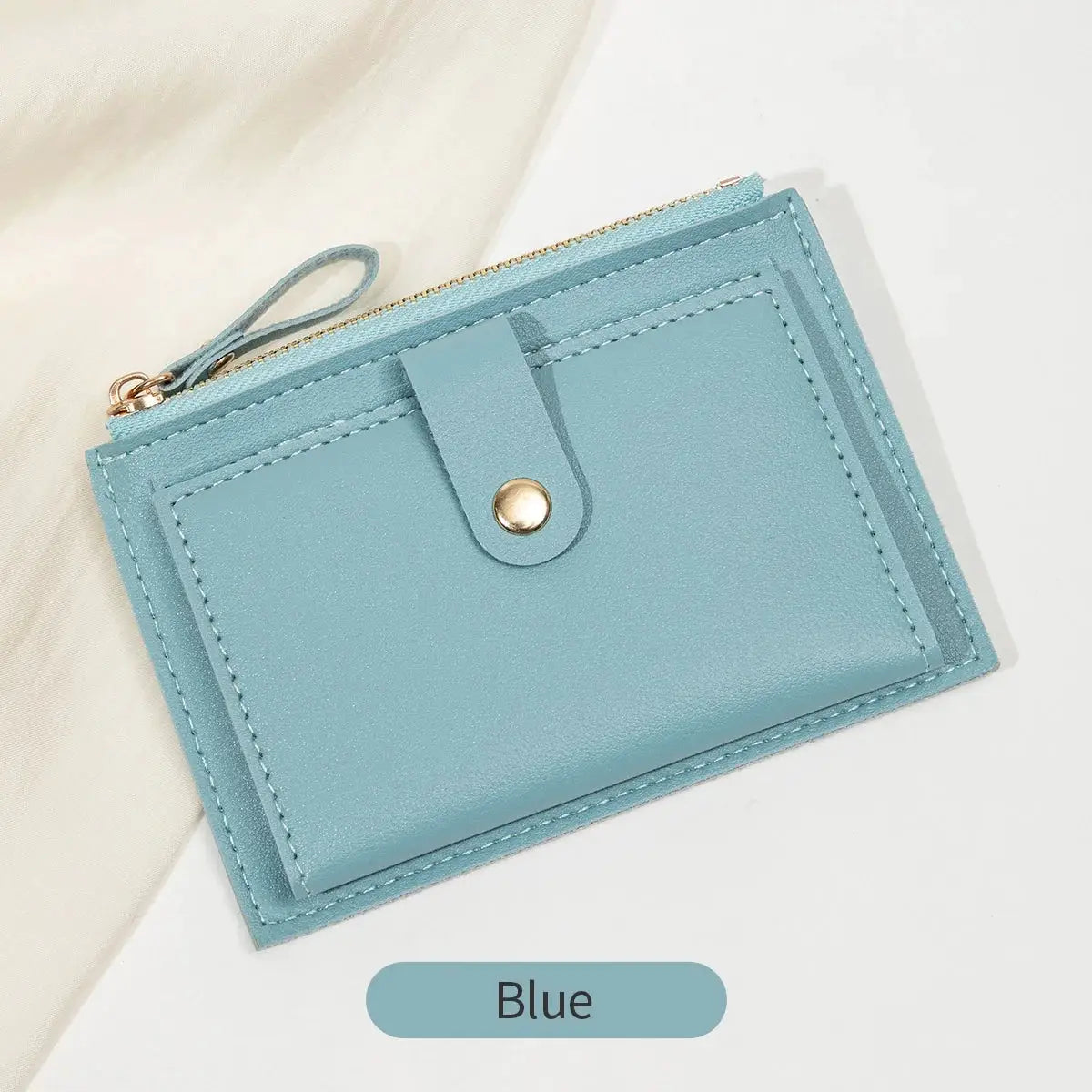 Card wallet for women in blue PU leather with zip closure and front snap strap