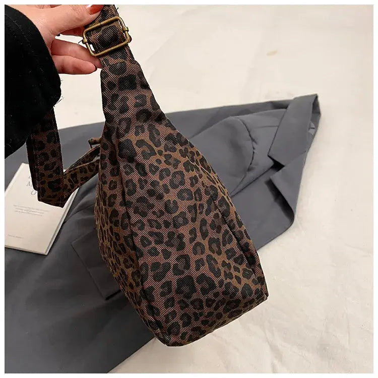 Leopard print shoulder bag by Simples Market, large-capacity soft textile crossbody for commute.