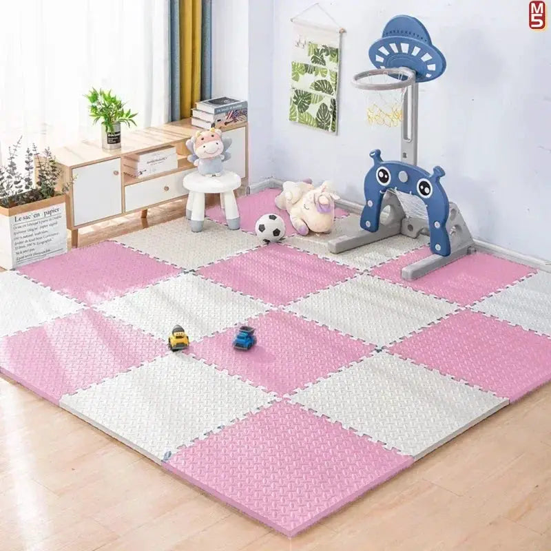 Interlocking EVA foam puzzle gym mats for home gym in pink and white with a non-slip surface