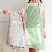 Simples Market Cotto Linen Striped Aprons set; green striped apron with pocket and pastel folded, stain-resistant.