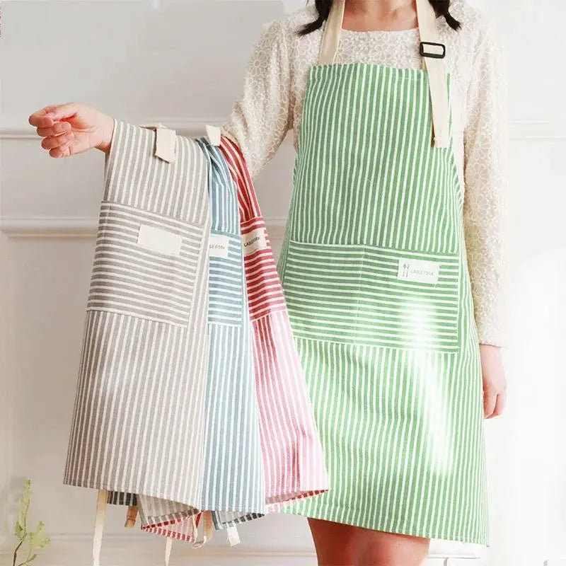 Simples Market Cotto Linen Striped Aprons set; green striped apron with pocket and pastel folded, stain-resistant.