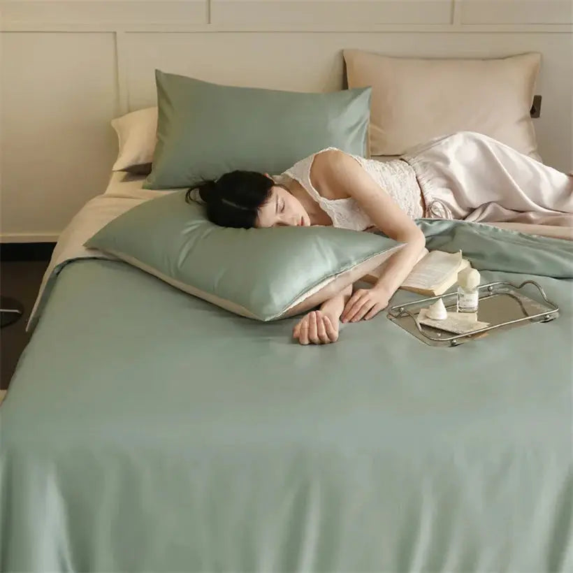 Mulberry Silk Bedding Set by Simples Market in teal-green; 100% silk duvet cover, sheets and pillowcases.