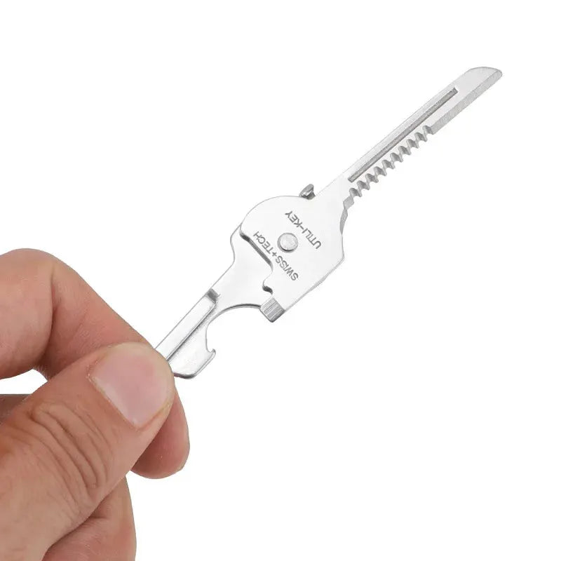 Simples Market 6-in-1 EDC folding tool keychain, silver metal with bottle opener and serrated blade