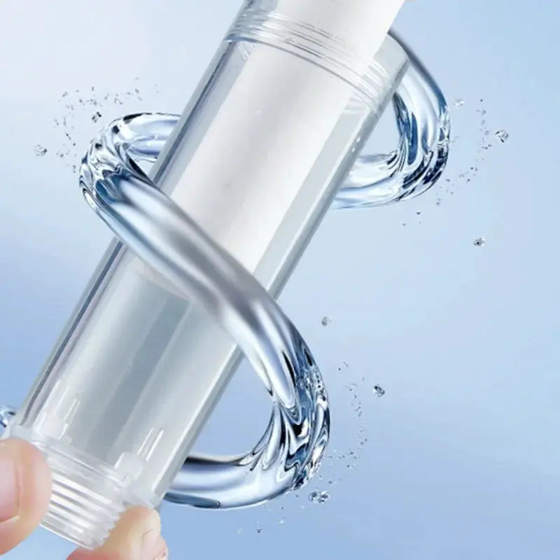 Travel portable pressurized shower head with transparent housing and white filter cartridge for hotel bathroom use
