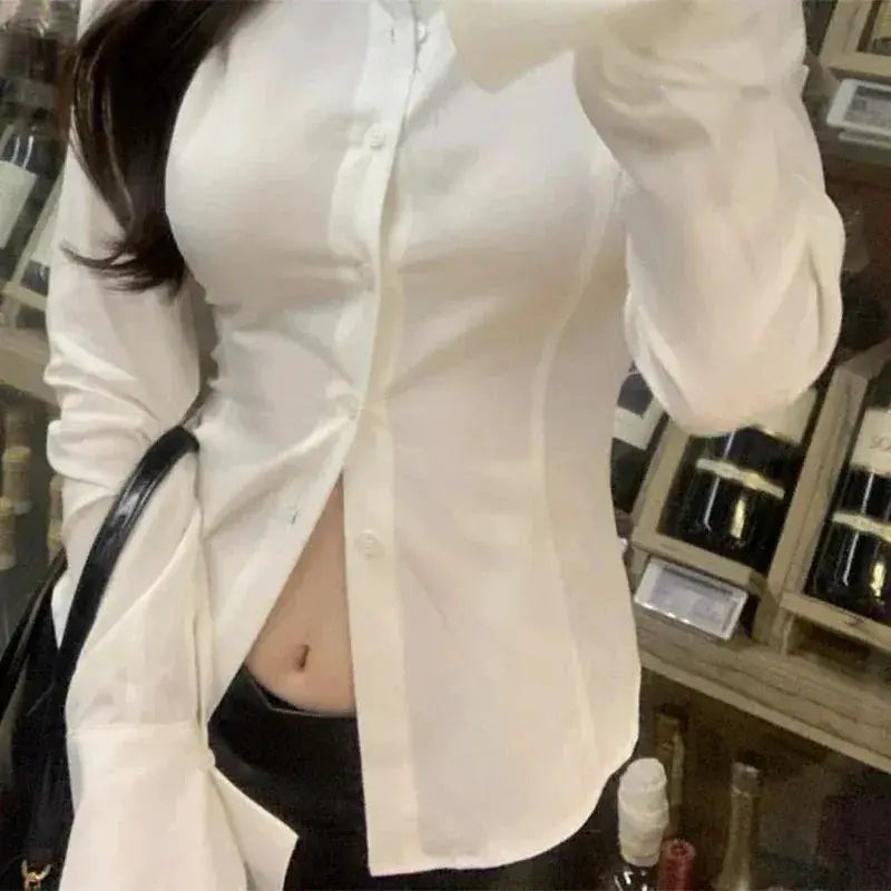 White slim-fit button-down shirt with long sleeves and lapel, single-breasted style