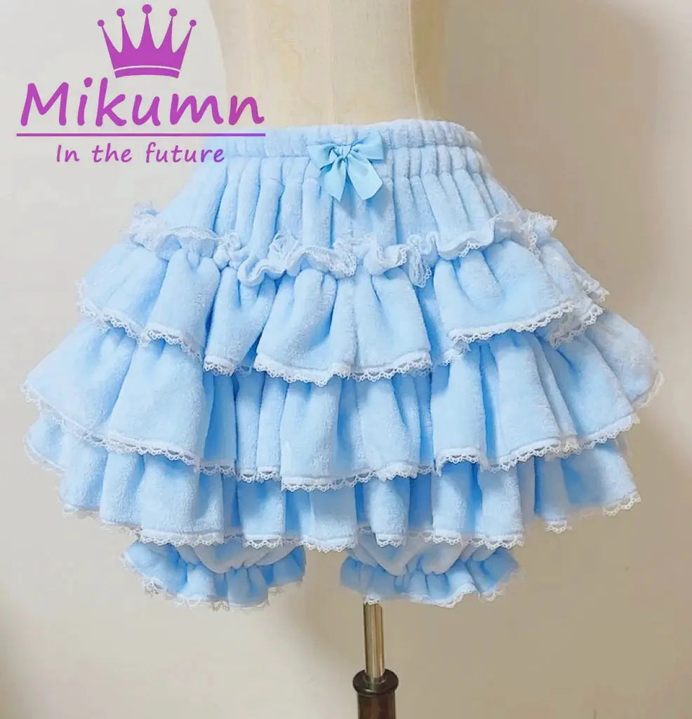 Light-blue layered ruffle lantern shorts with lace trim and bow, Mikumn watermark