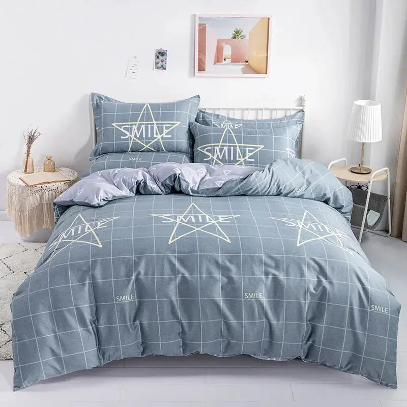 3pc cotton duvet cover set by Simples Market in blue grid print; includes duvet cover and 2 pillowcases