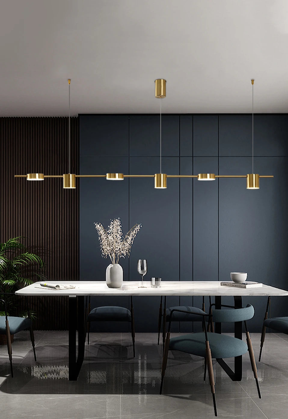Simples Market modern LED gold metal dining room chandelier, a linear pendant light over a marble dining table.