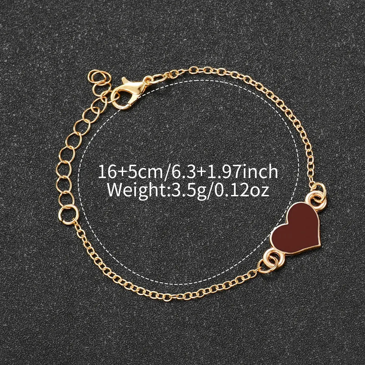 Bracelet by Simples Market: gold-tone heart charm on a delicate linked chain