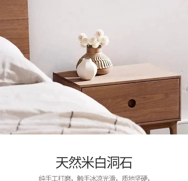 Natural stone wall lamp decor sconce on a wooden nightstand with white ceramic vases.