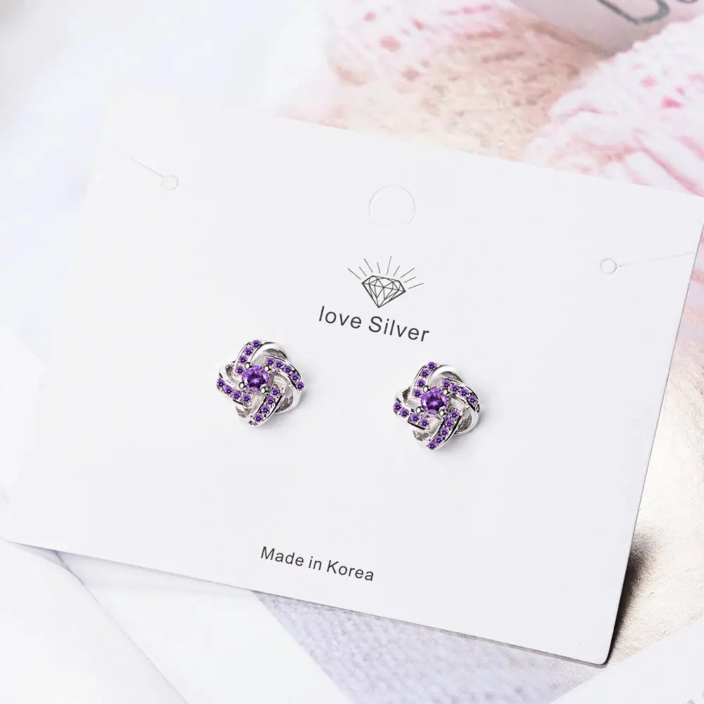 Sterling silver earrings for women with purple zirconia in an eternal heart twist design by love Silver (2 pcs)