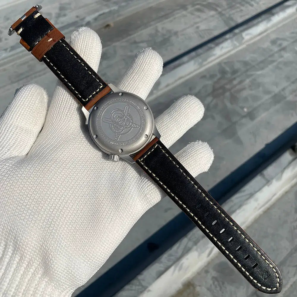 STEELFLIER SF752 mechanical wristwatch with black leather strap, brown edges, white stitching, stainless steel back