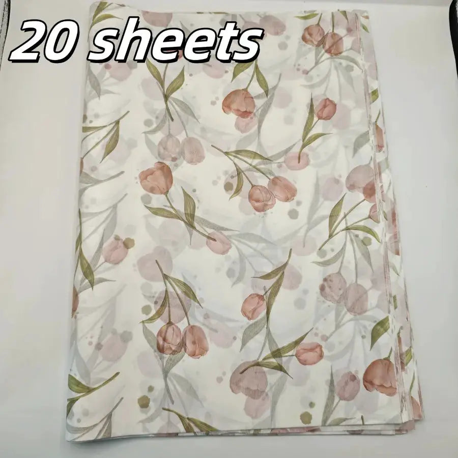 Tulip-patterned tissue paper with pink blossoms and green leaves on white, 20 sheets from Simples Market
