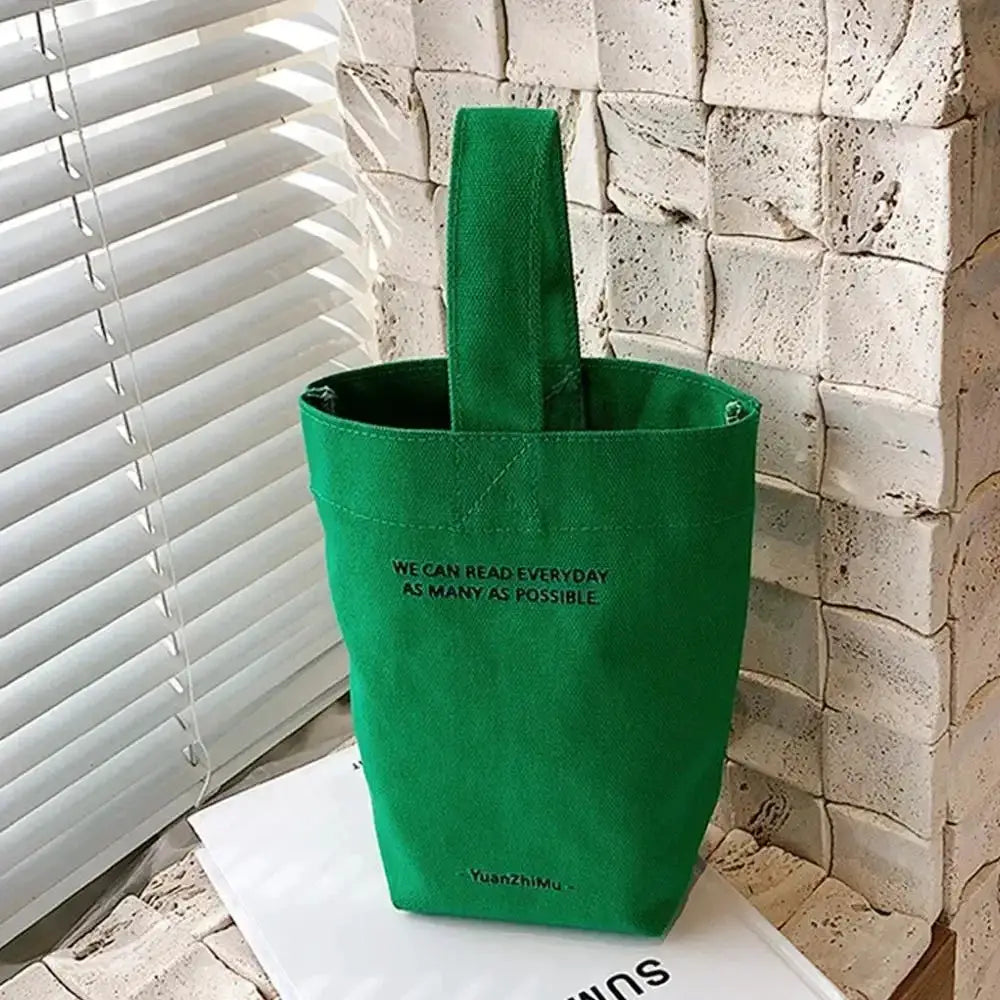Green canvas tote bag with top handle, large-capacity shopper by Yuanzhimu