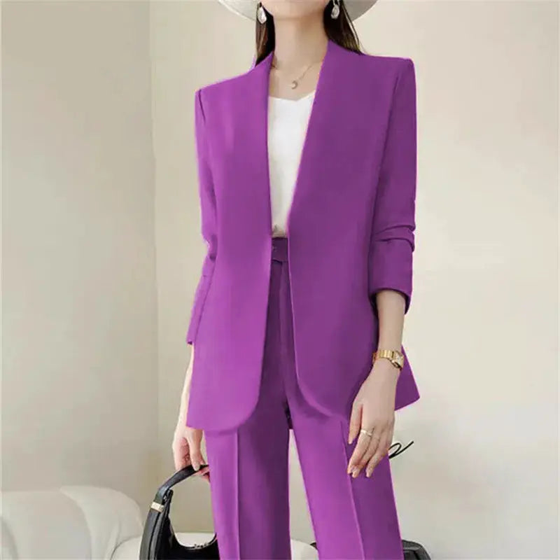 Women's purple 2-piece suit set with blazer and matching trousers, white top