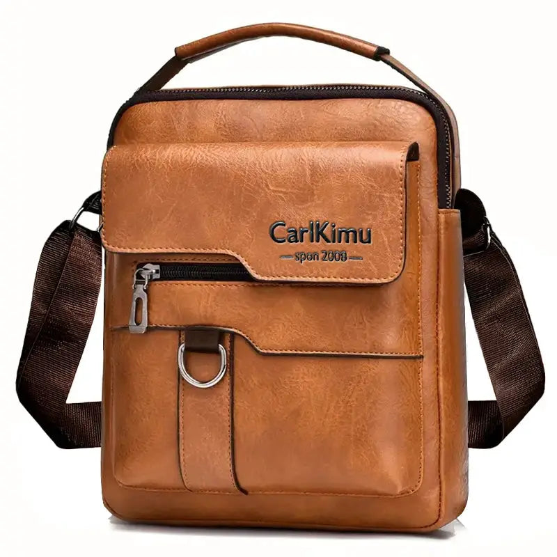 CarlKimu brown PU leather messenger bag with front zip pocket, D-ring detail, and adjustable shoulder strap