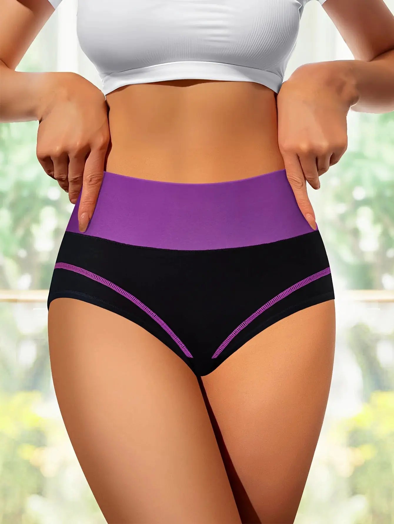 Women's high-waisted tummy-tightening panties in black with purple waistband and pink trim