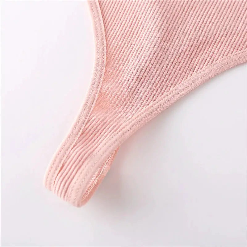 Cotton pink thong underwear by Simples Market, ribbed fabric, low-rise G-string.