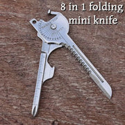 8-in-1 folding multitool keychain with ruler and bottle opener, SwissTech engraved metal tool.