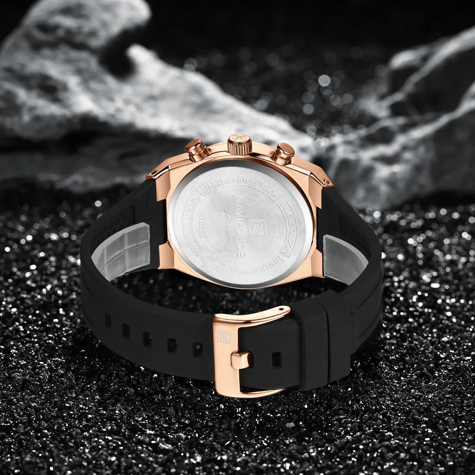 Naviforce 8080 men's watch with rose-gold case and black rubber strap, back view featuring a stainless steel back and logo