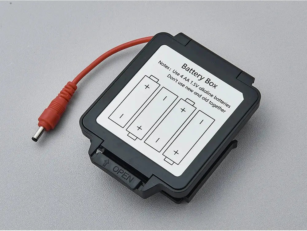 Battery box with red power lead on black plastic housing.